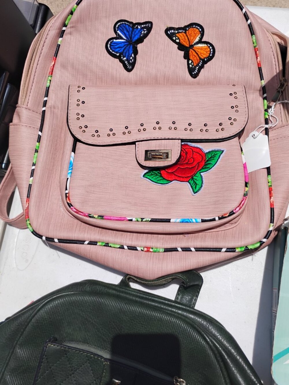 Embroidered Pink Backpack & Quilted Green Leather Bag